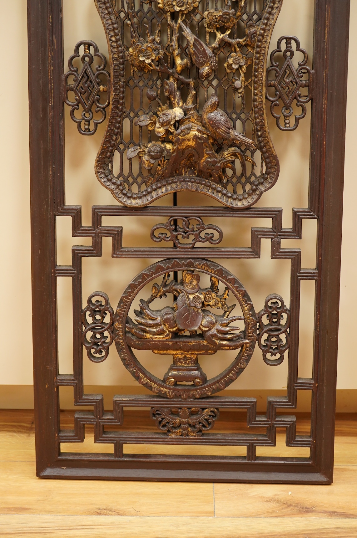 A 19th century Chinese gilt lacquered wood panel, 128cm high